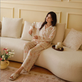 Full-length view of the Pink Still Bloom floral pajama set with relaxed pants