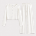 Ivory ribbed lounge cardigan and wide-leg pants flat lay