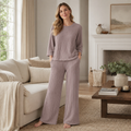 Full-length lifestyle view of the Quiet Rib pajama set in Mauve Taupe
