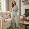 Full-length lifestyle view of the Quiet Rib pajama set in Sage Mist