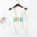White modal built-in bra tank with centered floral MOM graphic hanging flat lay