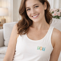 Woman wearing white modal built-in bra tank with left-chest floral MOM graphic