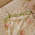 Green neckline trim and slender straps on the floral slip nightgown