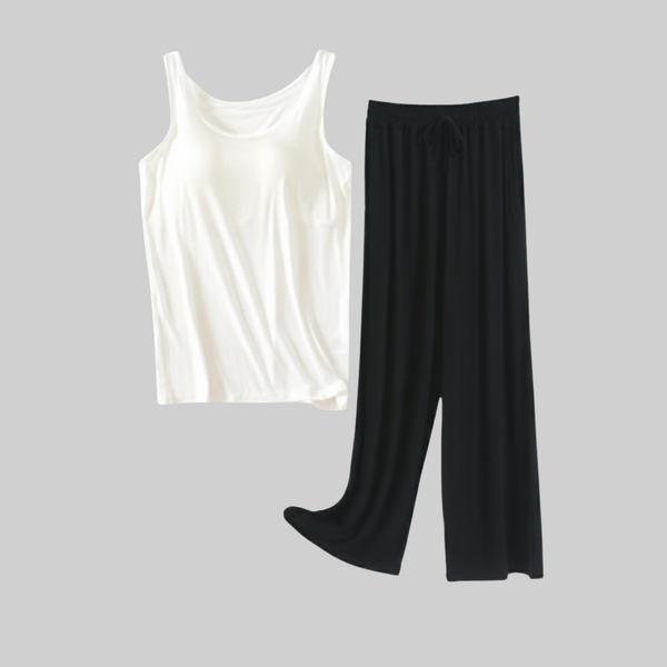 White built in bra lounge tank with black modal pants flat lay
