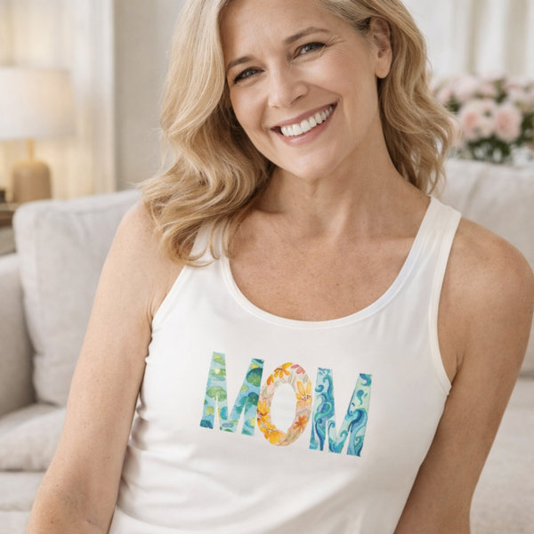 Woman wearing white modal built-in bra tank with centered floral MOM graphic