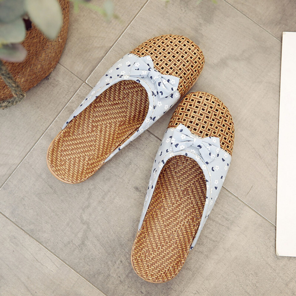 Women’s floral woven mule slipper upper and bow detail