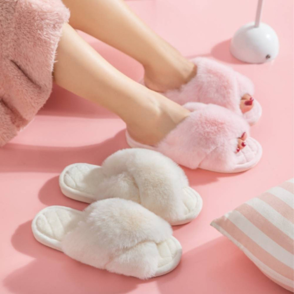 Woman wearing Pink and Ivory faux fur cross-band house slippers