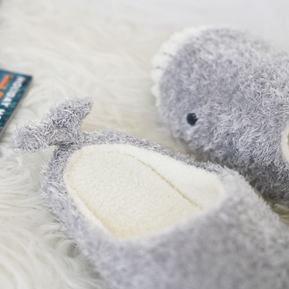 Close-up of gray whale slipper opening and stitched toe detail