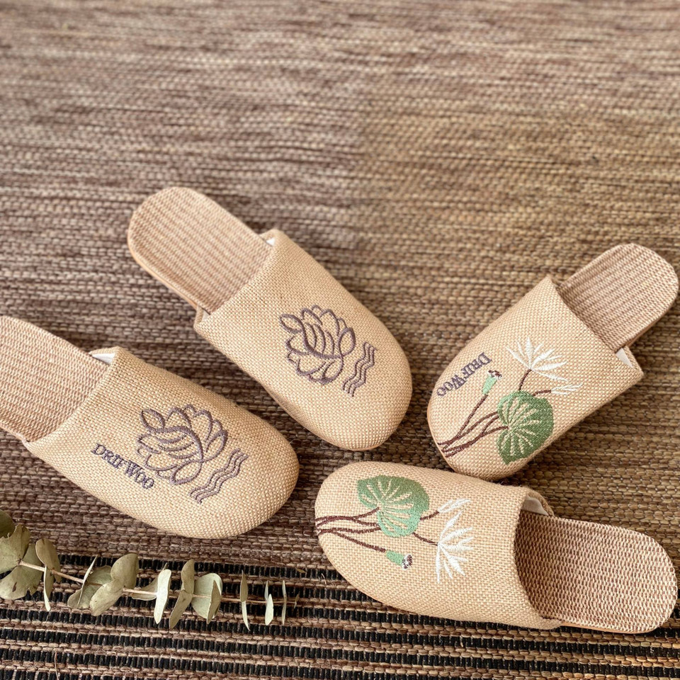 Women’s linen botanical slippers styled for gifting