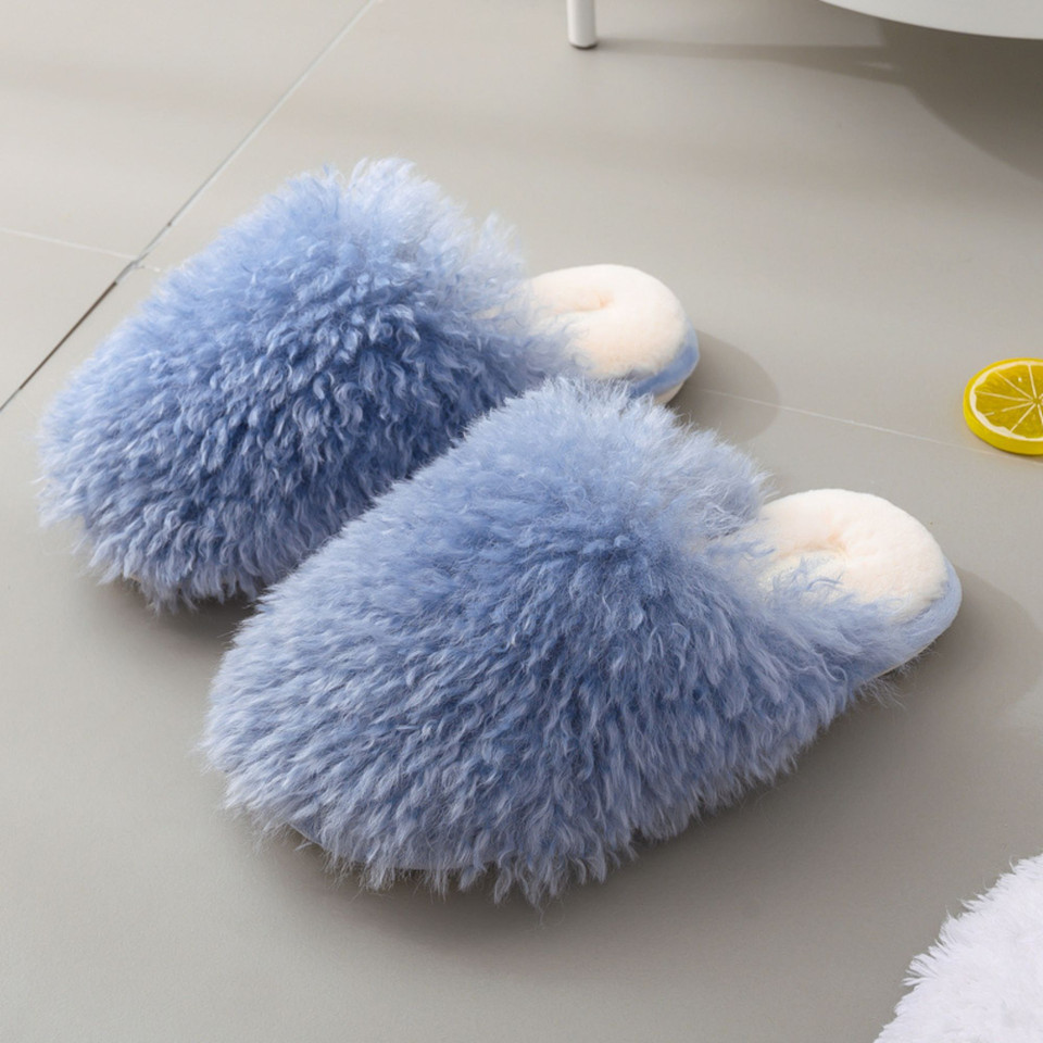 Plush faux fur-style upper detail on a house slipper