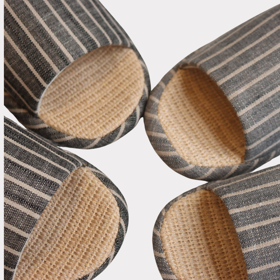 Striped slipper upper and textured footbed detail