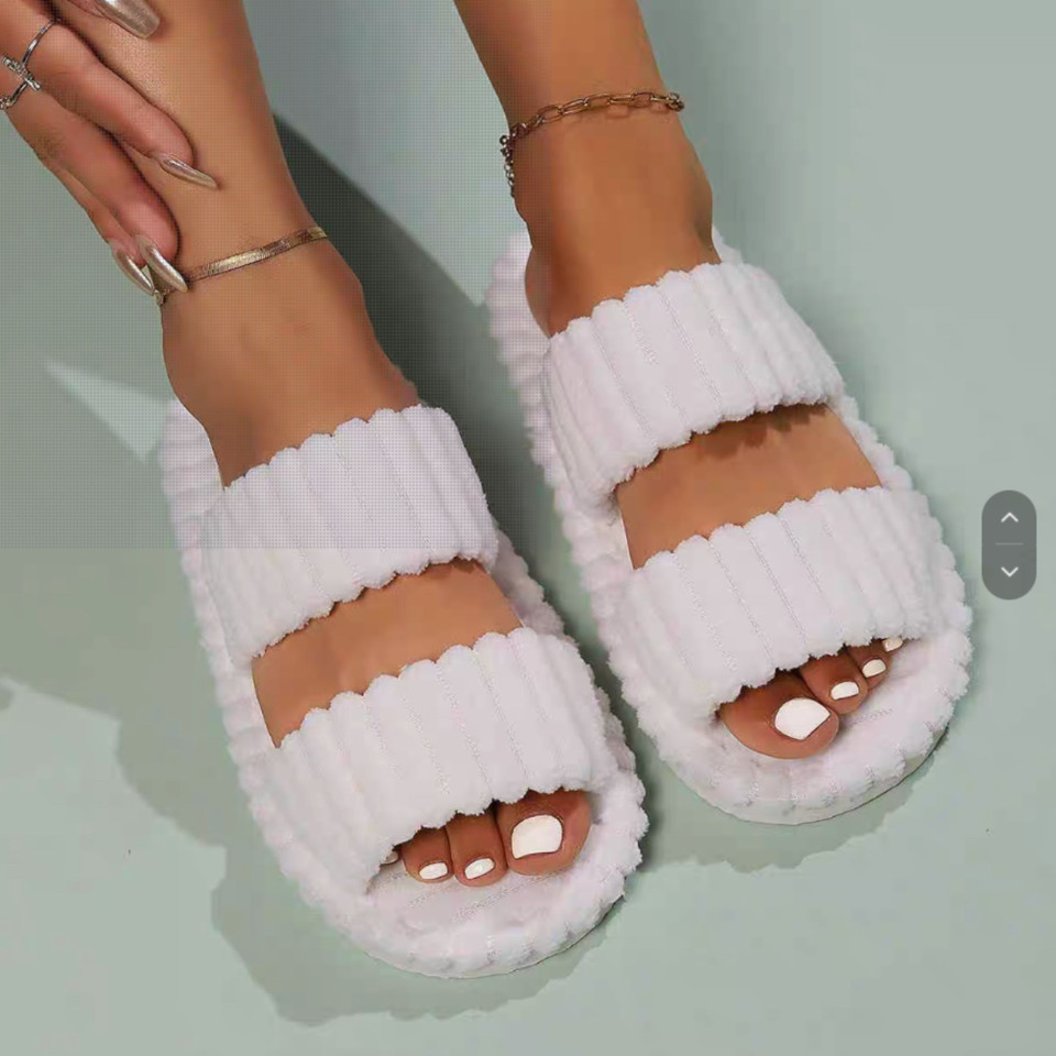 White ribbed plush double-band slippers worn indoors