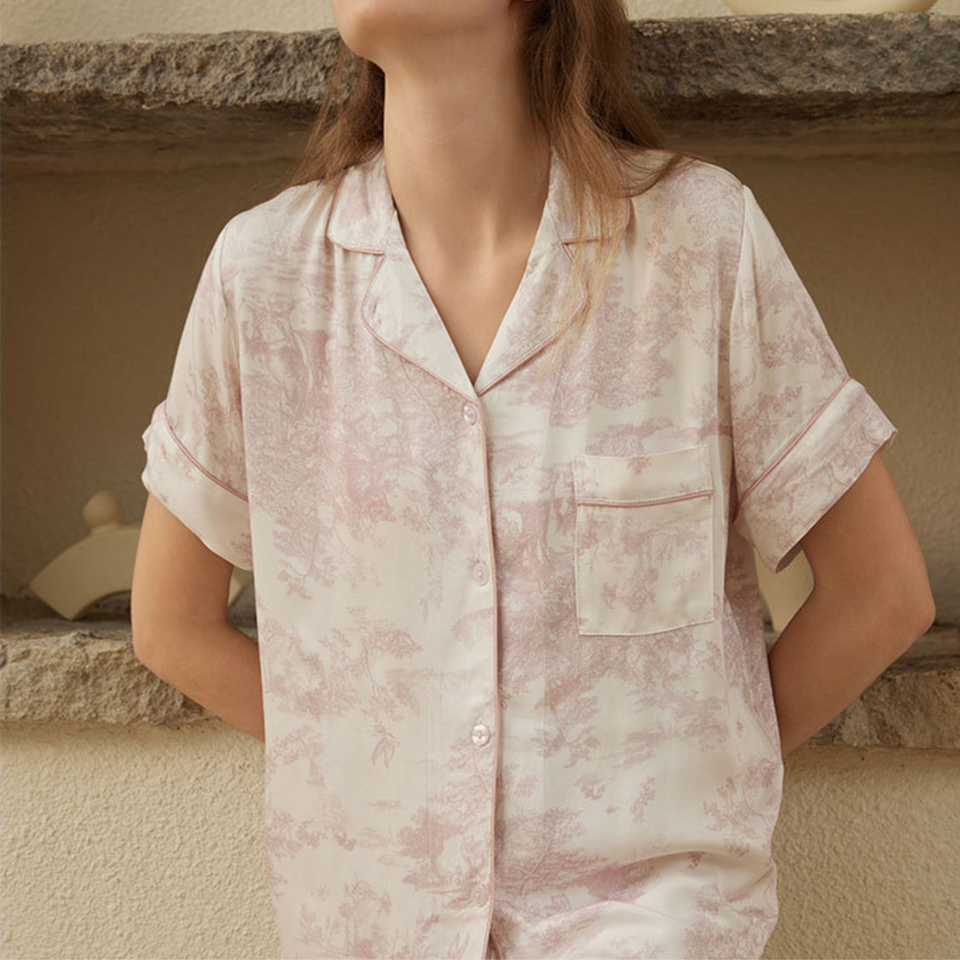 Woman relaxing in Blush Toile short sleeve viscose pajamas