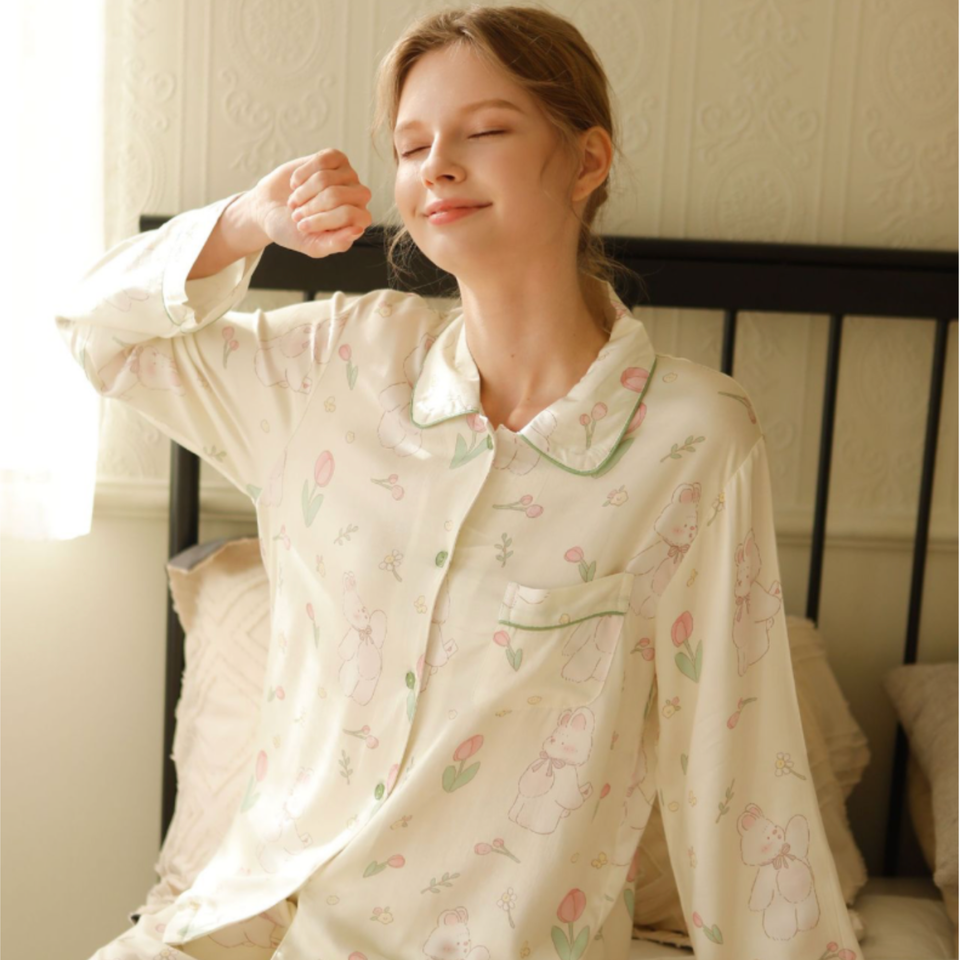 Woman relaxing in woodland garden bamboo cotton pajama top