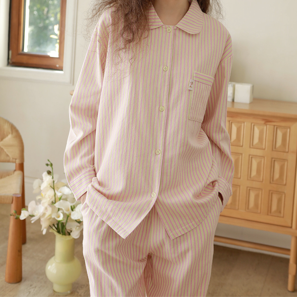 Pink striped brushed cotton flannel pajama set showing button front and relaxed fit
