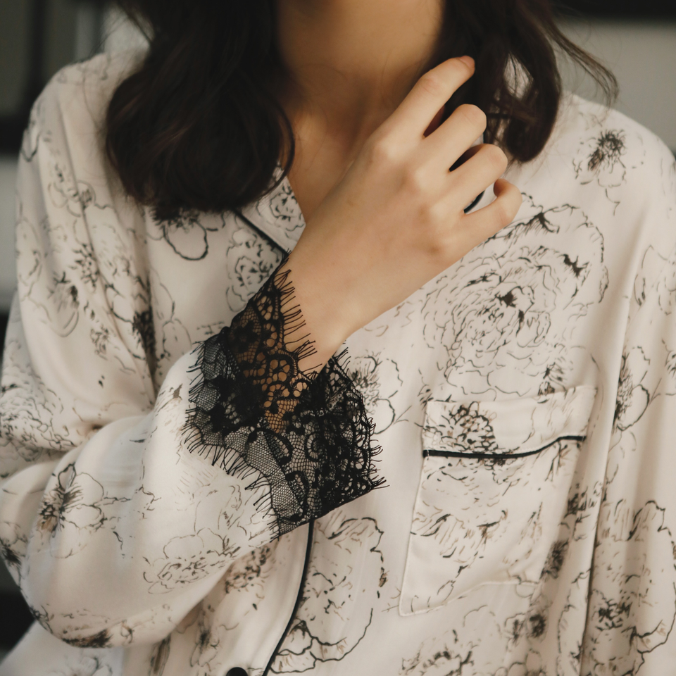 Relaxed lifestyle view of the Ink Garden 100% viscose pajama set