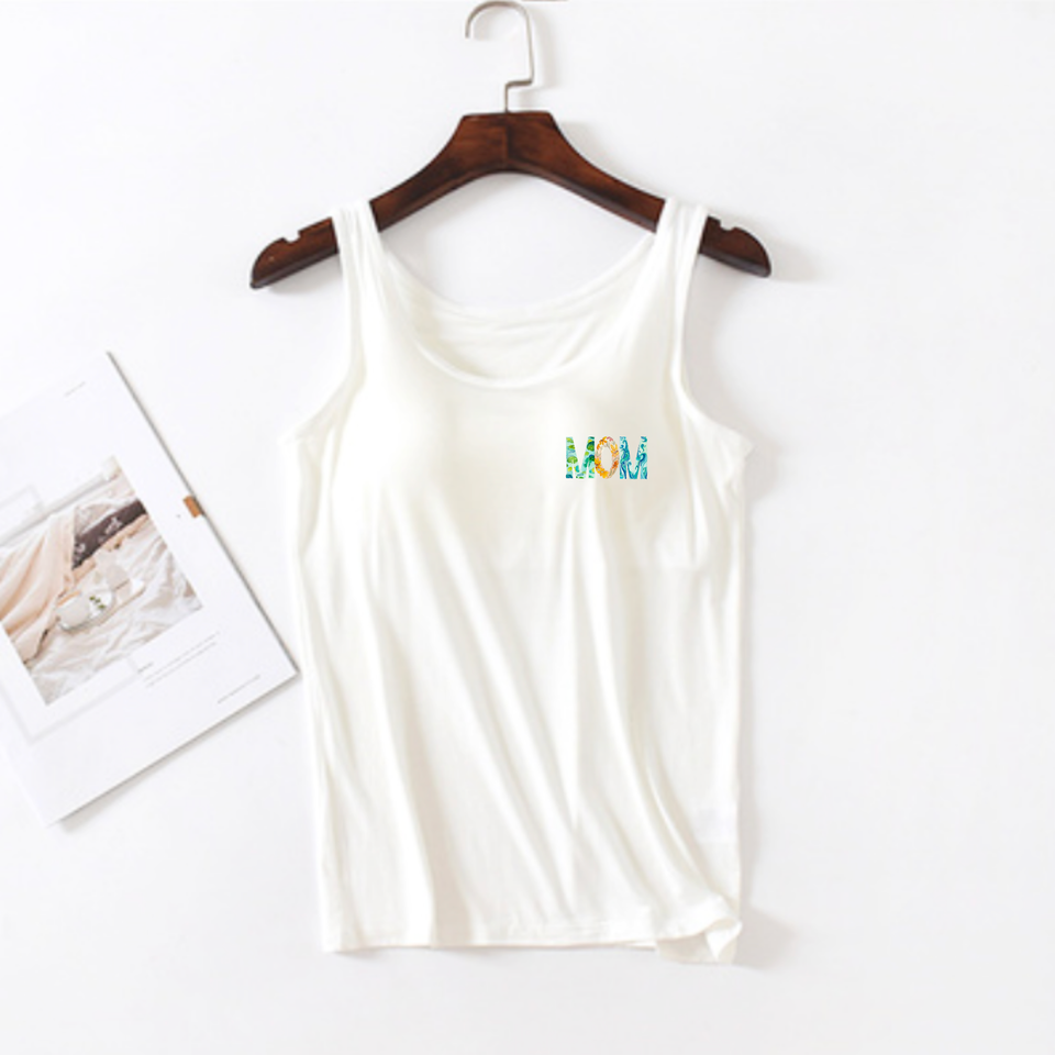 White modal built-in bra tank with left-chest floral MOM graphic hanging flat lay