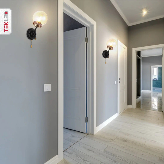 Antique Brass and Black Amber Glass Globe Wall Light Fitting with Pull Down Switch