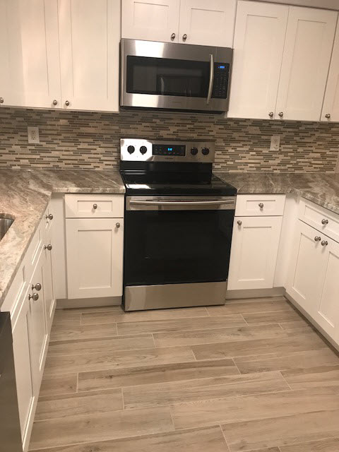 New tile and cabinets transformed this kitchen.