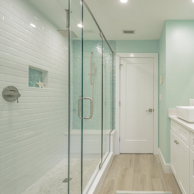 Contrast white subway tile with seafoam green