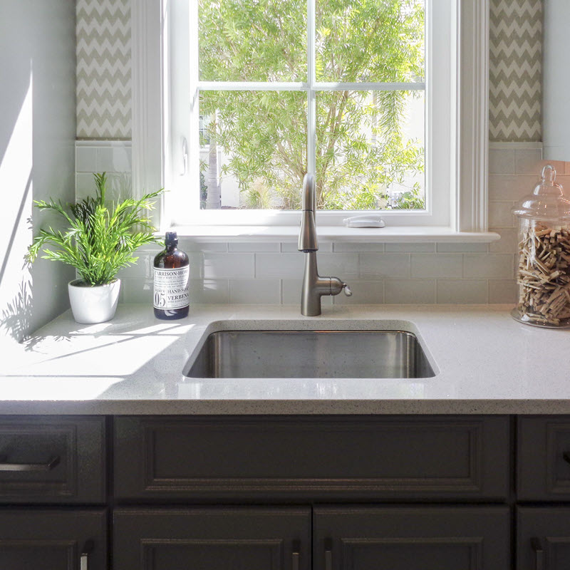 Glass subway tile backsplash