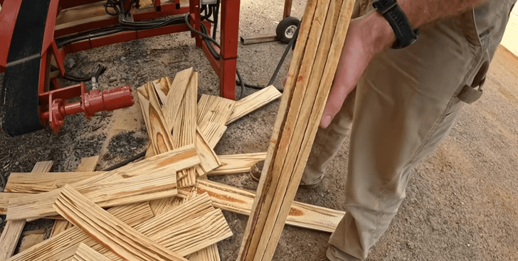Fresh cut pallet boards after processing cants through PR6 resaw, showing clean consistent cuts and efficient lumber recovery in pallet mill