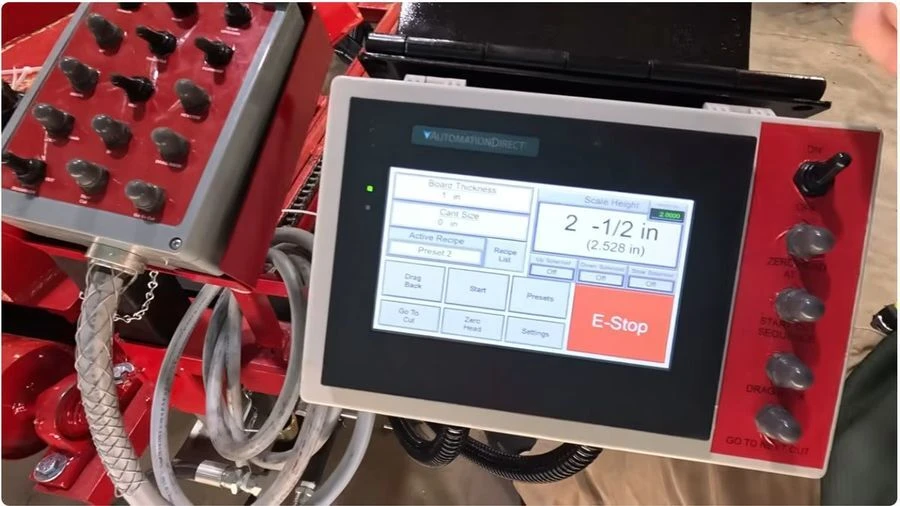 Cook&rsquo;s Saw Computer Setworks touchscreen beside the separate hand-held sawmill control box.