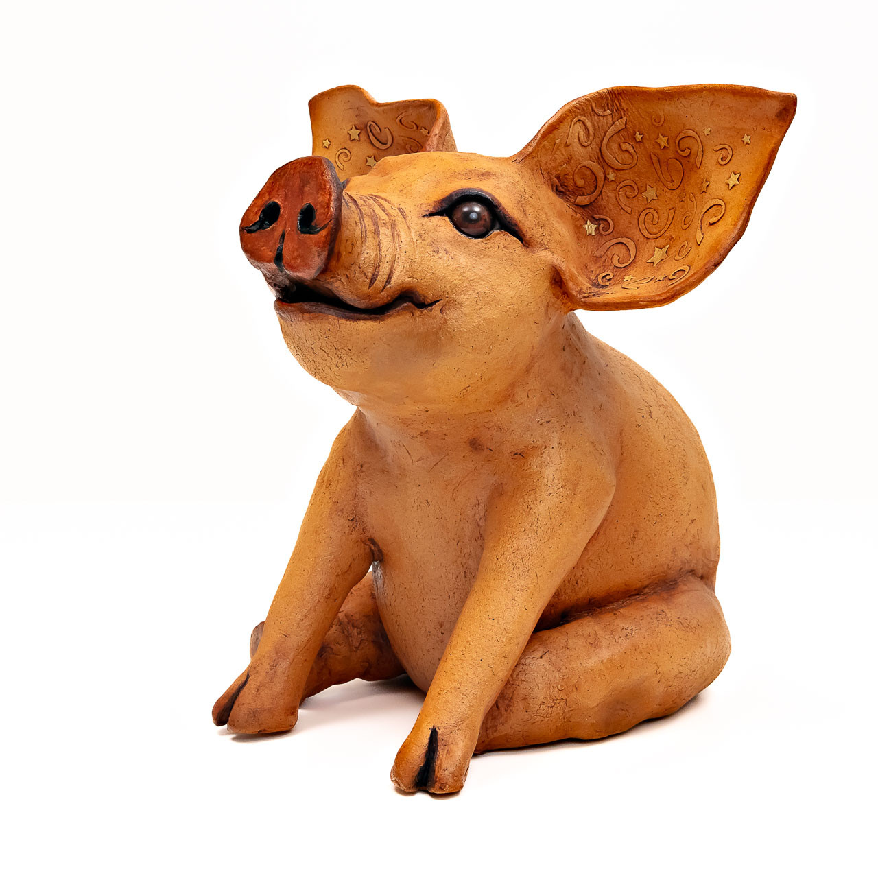 Hand sculpted ceramic sitting pig
