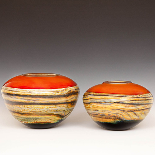 two orange glass spheres two orange glass spheres