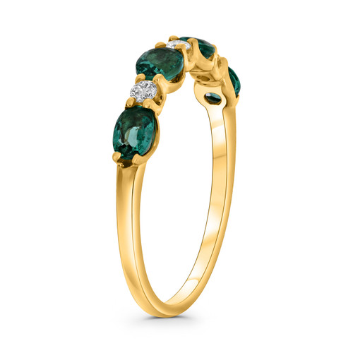 Gold ring with emeralds and diamonds by Roman and Jules