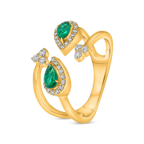 Gold ring with emeralds and diamonds by Roman and Jules