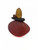 Back view of blown glass cairn sculpture by Melanie Leppla with three glass stones stacked on top of a deep red base