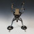 Director's Cut - DeJUR Electra Movie Camera sculpture back view with jointed steel legs by Adam Homan