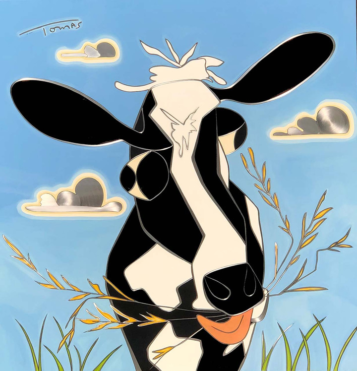 large cow with clouds