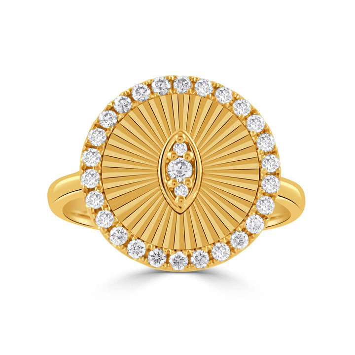 large gold circle ring with diamonds around the edge and in center