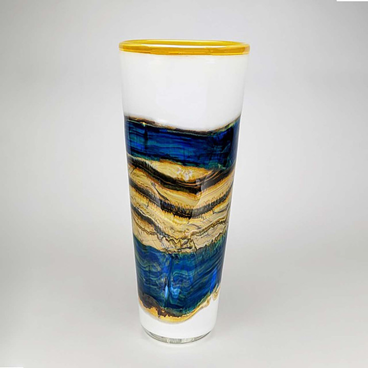 blue and white tall glass container