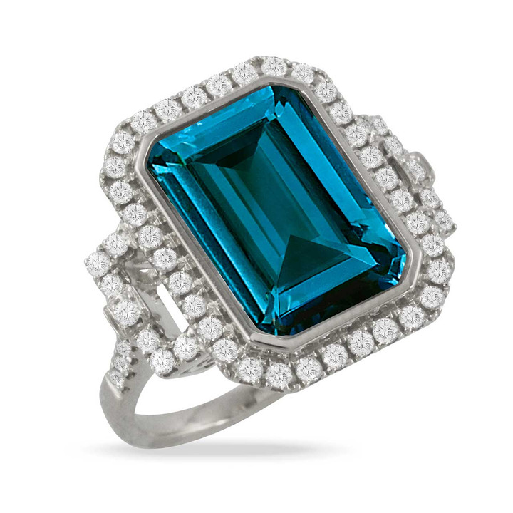 white gold ring with large blue topaz and diamonds