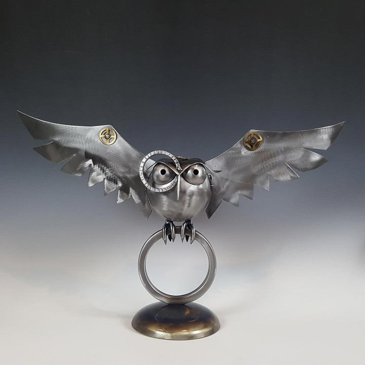 guardian owl on ring metal sculpture front