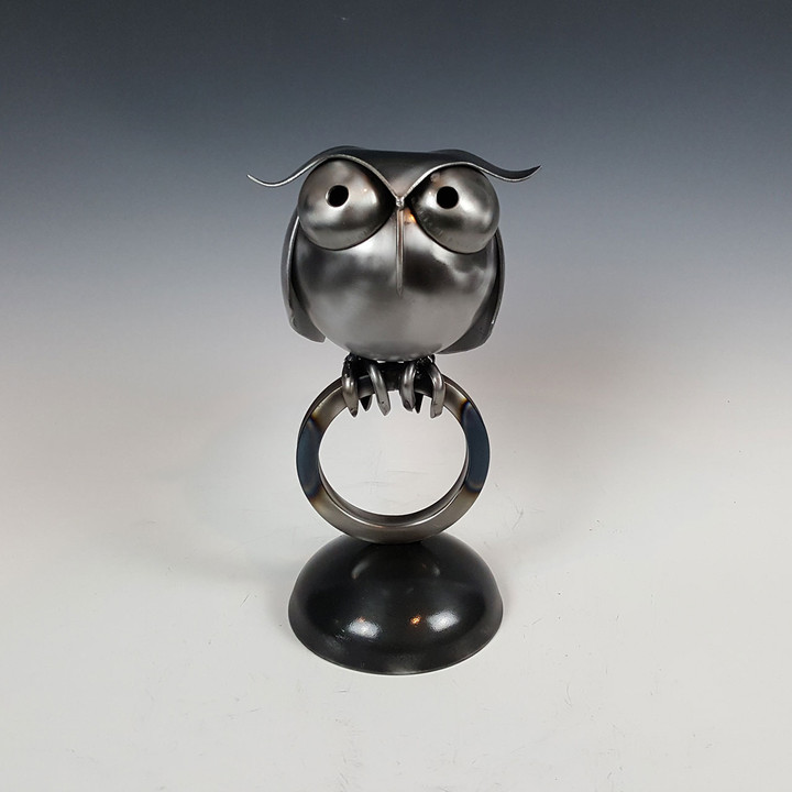 Steel owl sculpture by Adam Homan