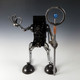 selfie metal sculpture with vintage kodak camera