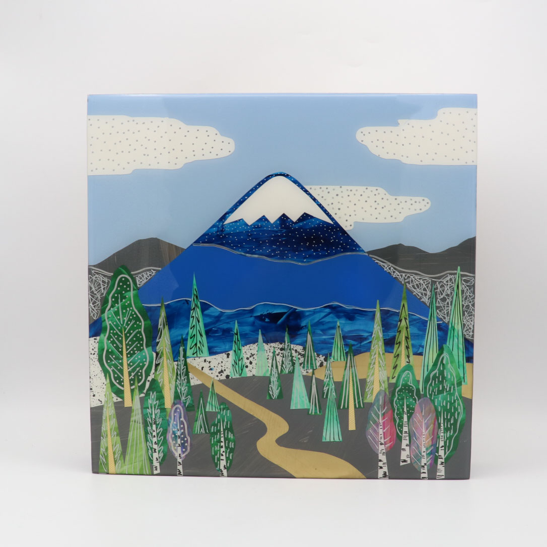 A mountain landscape made with mid-century modern collage, made of