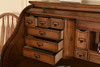 Solid Oak Roll Top Deluxe Executive with Burnished Antique Medium Stain
Double Pedestal with Locking File Drawers and Tambour
Classic Antique Styling with Dove Tailed Drawers and Raised Panel Sides