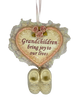 Grandchildren Bring Joy To Our Lives engraved on frilly lace trimmed heart with roses and dangling baby shoes in a vintage style Christmas Ornament