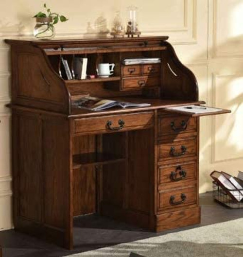 Solid Oak 42" Roll Top Desk Perfect for small areas and as a student desk
Single Pedestal with Locking File Drawer
Solid Wood Construction
Dovetailed Drawers
Shown Burnished Walnut Stain on Oak