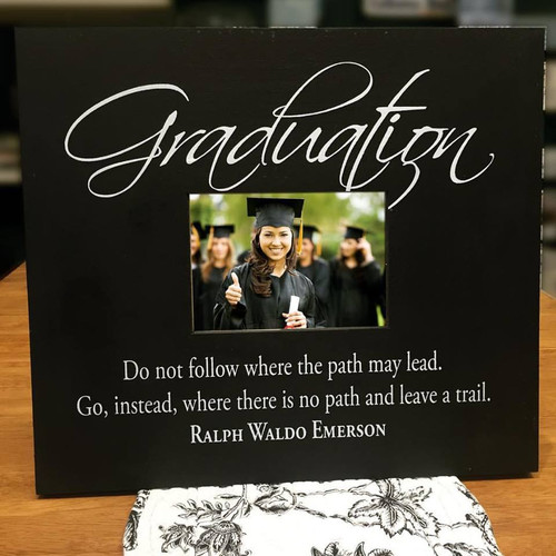 Graduation Do not follow where the path may lead. Go, instead, where there is no path and leave a trail. - Ralph Waldo Emerson