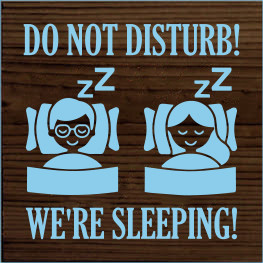7x7 Walnut Stain board with Light Blue text
Do Not Disturb We're Sleeping