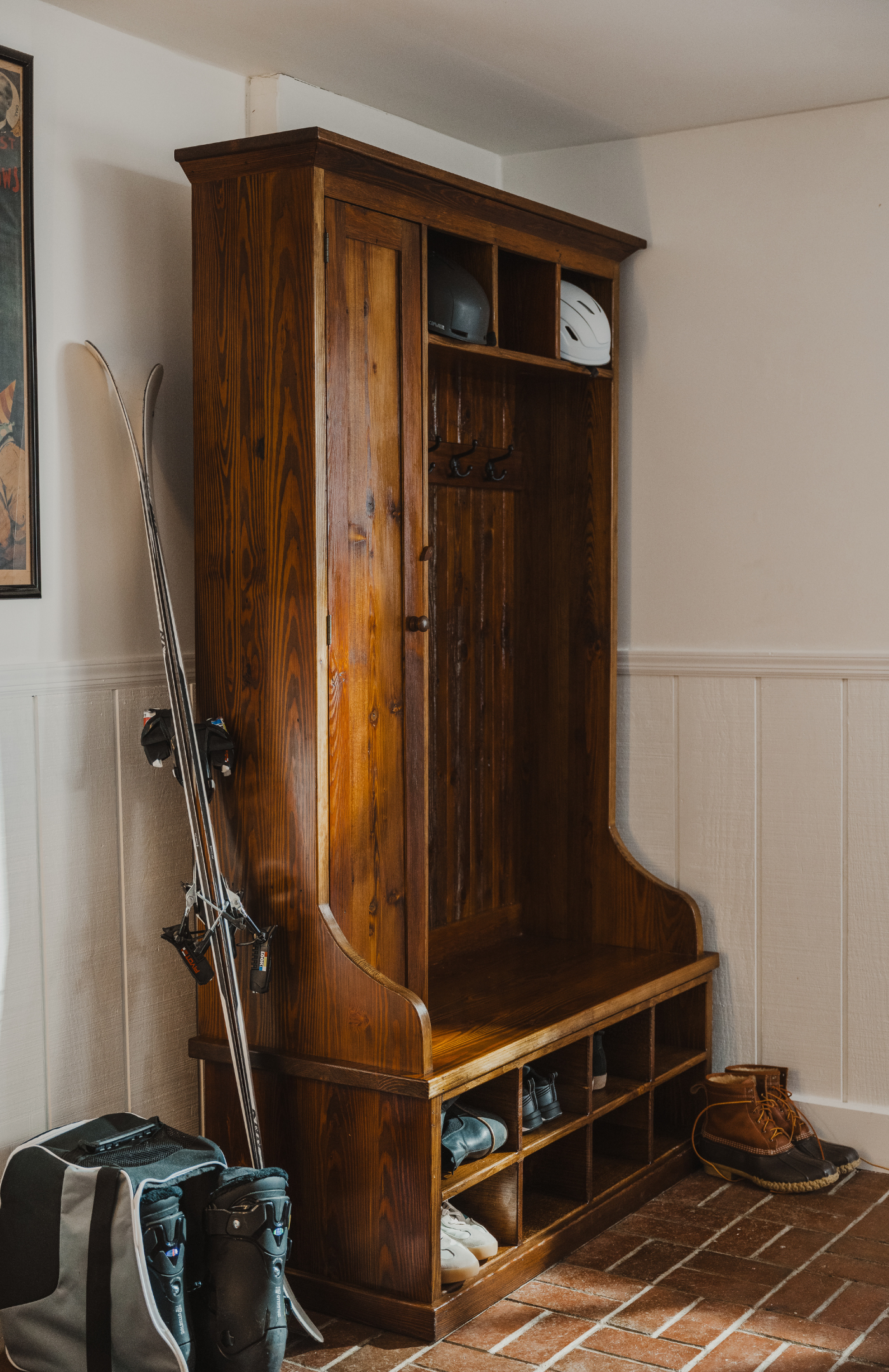 Entryway with reclaimed wood bench and hooks