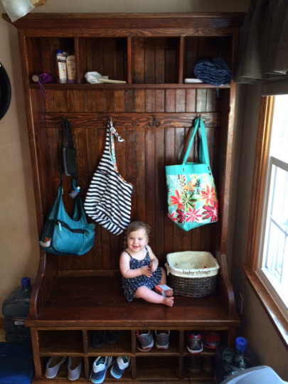 Entryway with reclaimed wood bench and hooks