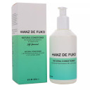 featuring a minimalist design with a matte finish. The label highlights its organic ingredients and sulfate-free formula, emphasizing premium hair care. The bottle has a clean, modern look, reflecting its natural and high-quality formulation.