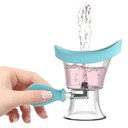 A pair of blue and pink silicone eye wash cups, ergonomically shaped to fit comfortably around the eye area.